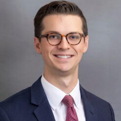 Smiling man in suit and tie